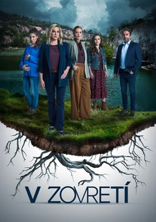 V zovretí
